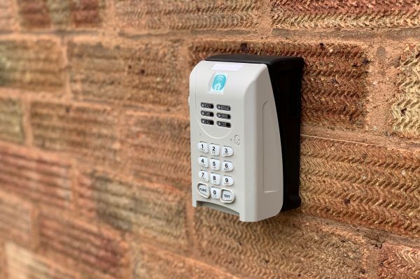 SentriKey key safe installed on a brcki wall