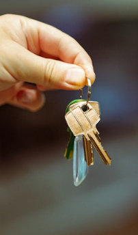 Eradicate key loss with SentriGuard - a person holding a set of keys