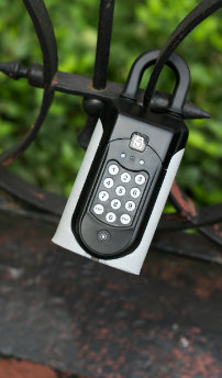 Keys at point of need - SentriGuard key safe attached to a fence
